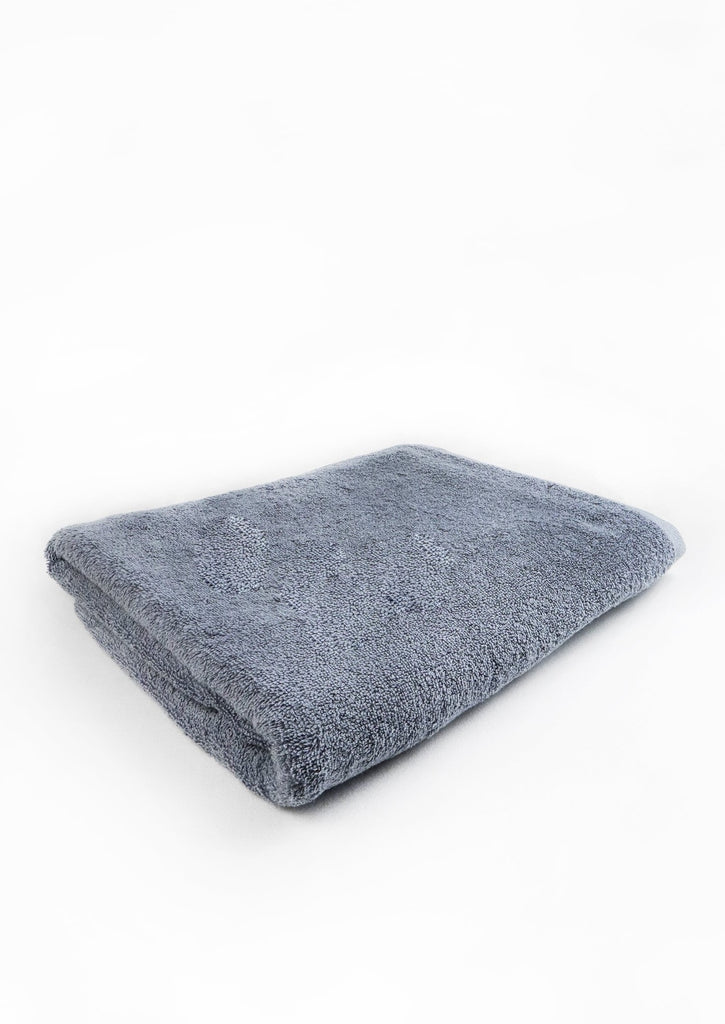 folded anchor grey towel on white background