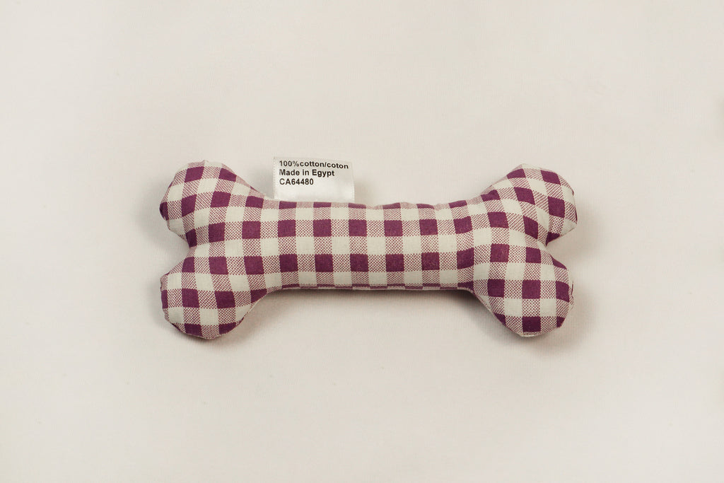 white and purple patterns toy bone