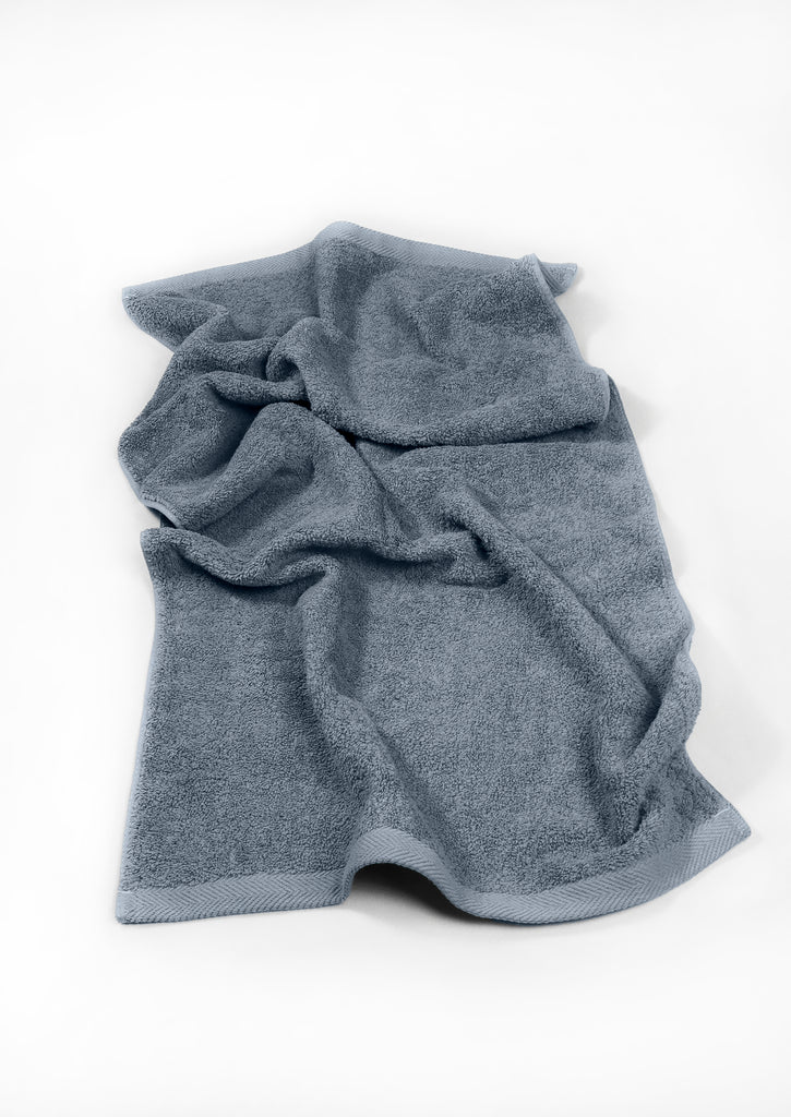 flat lay of anchor grey towel