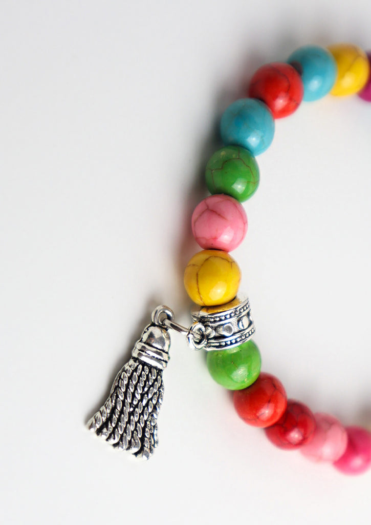 Candies Bracelet on a white background - zoom on tassel