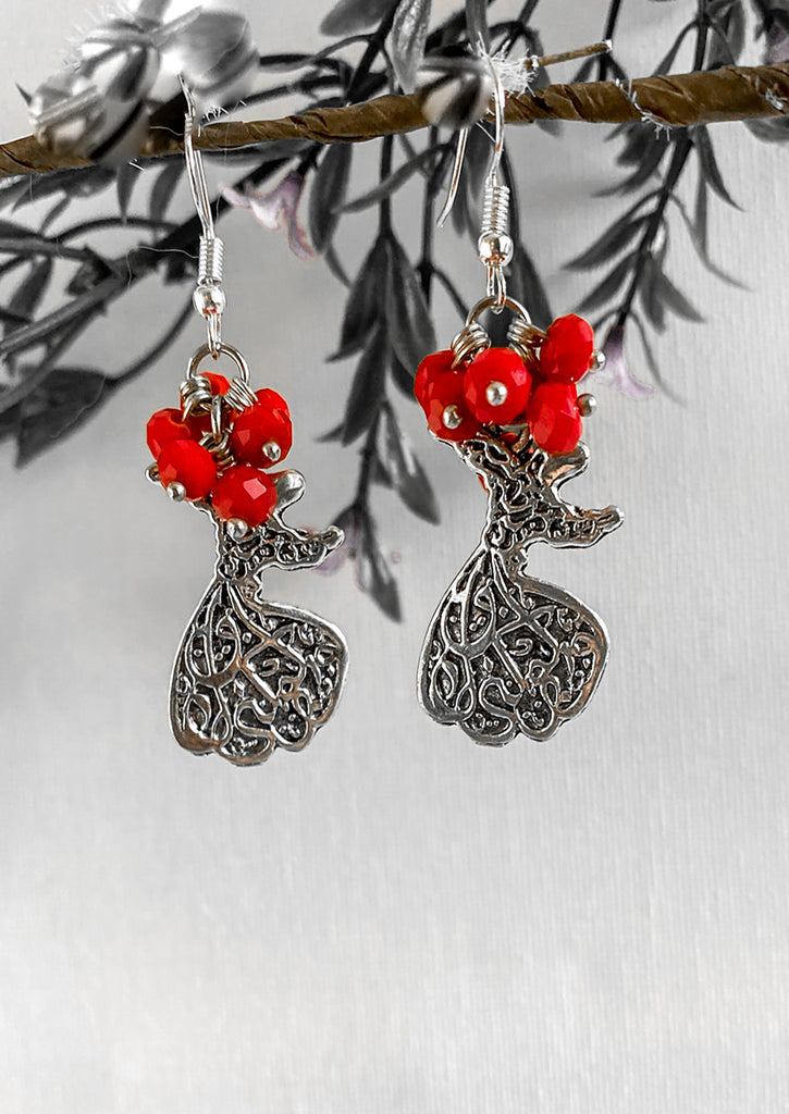 Tannoura Dancer Earrings on a tree branch