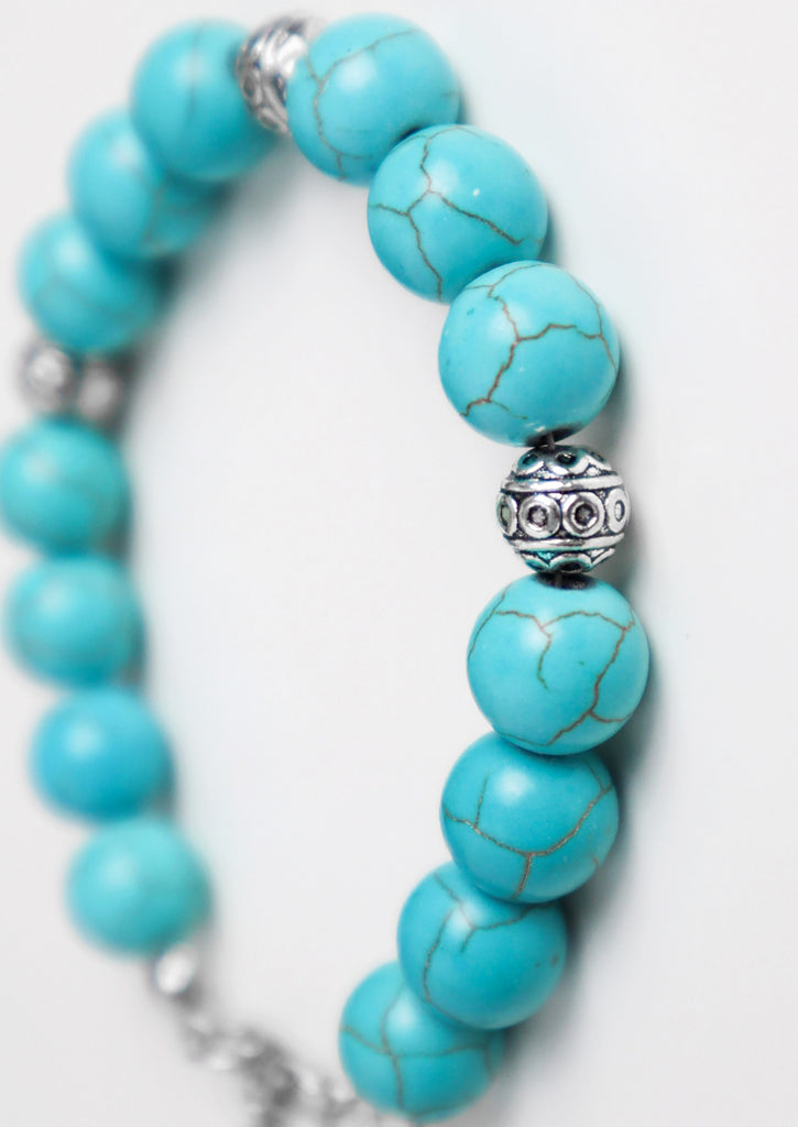 zoom on beed of cypsy coin bracelet - turquoise