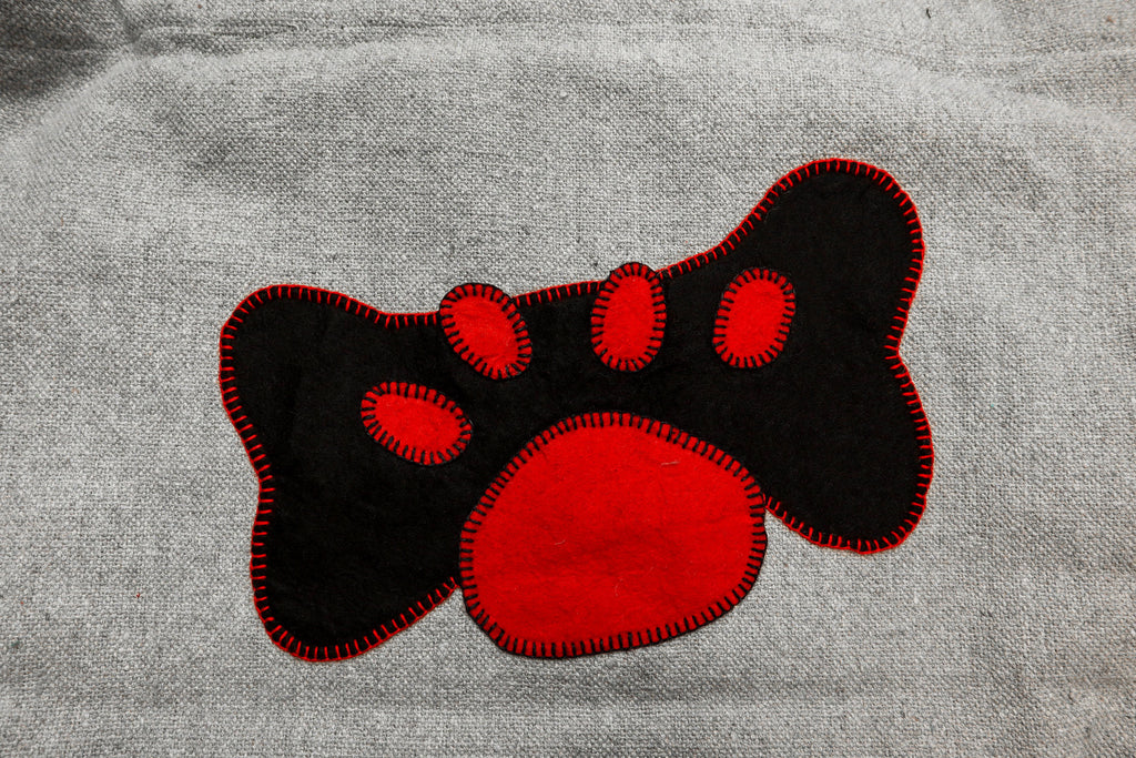 black | red paw