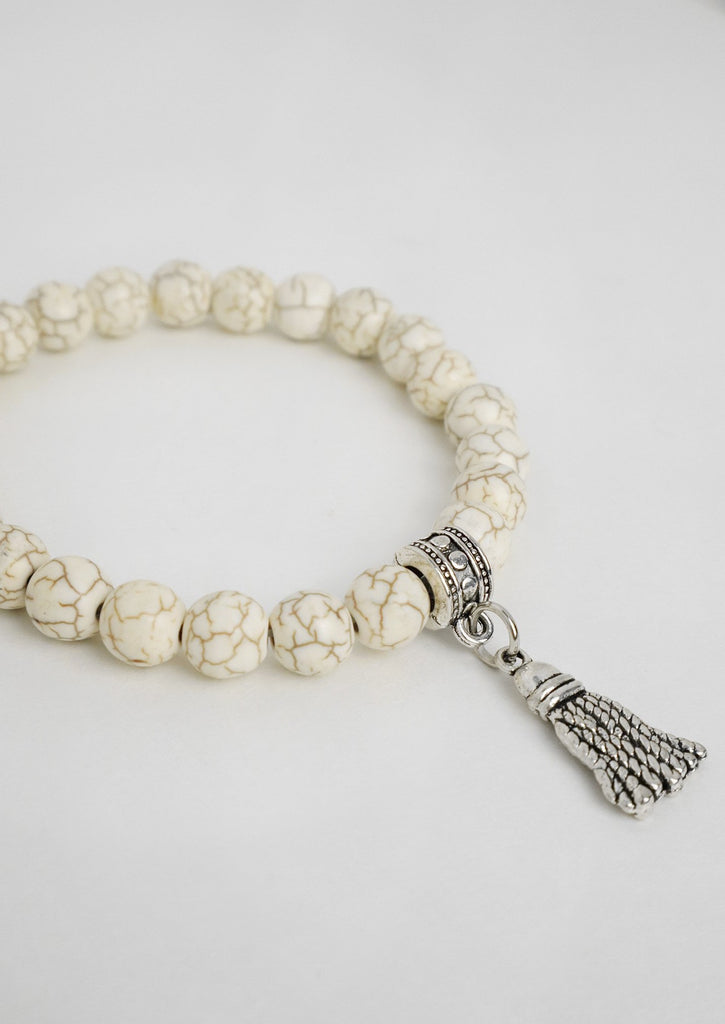 Side photo for cream marble bracelet on white background 