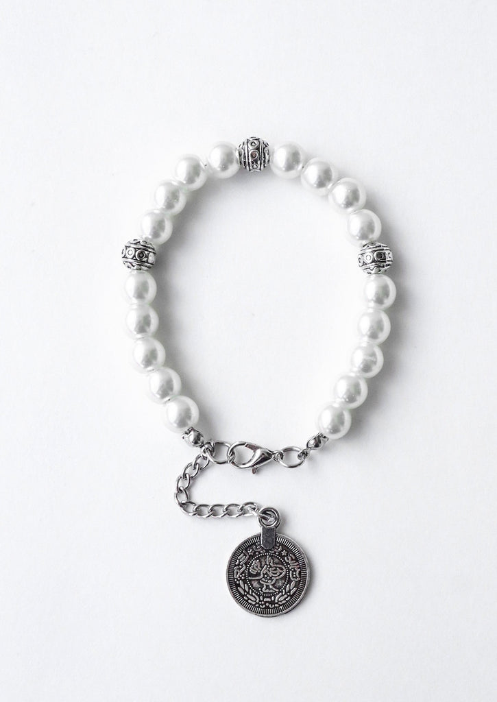 gypsy coin white bracelet on white background