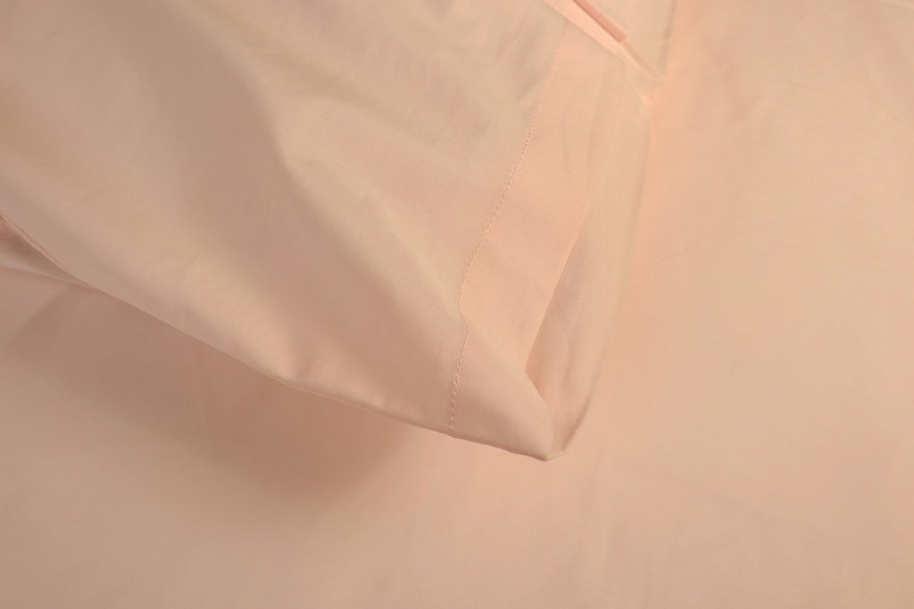 close look on the stitches on the pillow case - flamingo pink sheet set