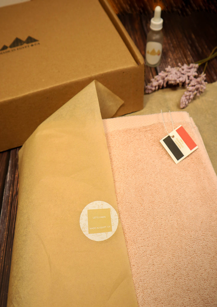 peach towel with 100 Egyptian Cotton label from made in Egypt