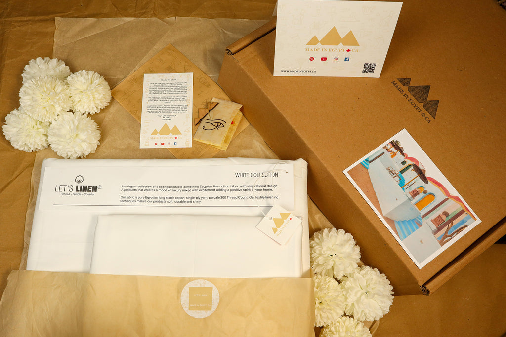 eco friendly packaging for pearl white sheet set with white flowers